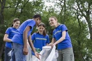 Jupiterimages/Creatas/Getty Images Early participation in charity and volunteer work teaches your child to develop a service-orientation toward others.
