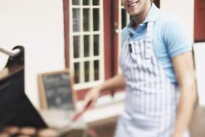 Jupiterimages/Brand X Pictures/Getty Images Birthday teens in Indianapolis have a chance to learn special grilling techniques at a unique party experience.