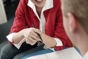 Comstock Images/Comstock/Getty Images Conferences and regular communication with day care teachers help you understand your child's needs and development.