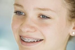 BananaStock/BananaStock/Getty Images Your young teen can find the help she needs to overcome emotional obstacles at a residential treatment school.