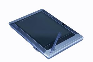 Comstock/Comstock/Getty Images Educational technology tools such as the iPad offer students a more multidimensional experience than traditional textbooks.