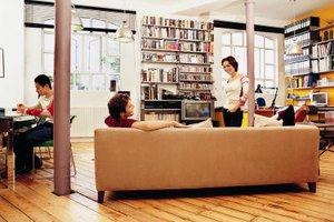 Digital Vision./Digital Vision/Getty Images Condos and apartments offer many of the same benefits with varying maintenance costs and responsibilities.