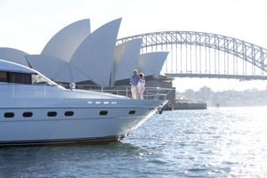 David Woolley/Stockbyte/Getty Images Because he knew that a limitless number of curved triangles could be drawn on a sphere, Jorn Utzon was able to complete the beautiful vault architecture of the Sydney Opera House.