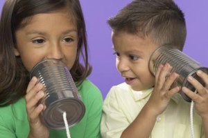 Jack Hollingsworth/Digital Vision/Getty Images Help children understand hearing impairments with activities that help them experience sound distortion.