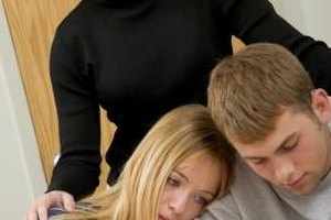 Jupiterimages/liquidlibrary/Getty Images Social workers, counselors and law enforcement work closely with families to identify and prevent child abuse.