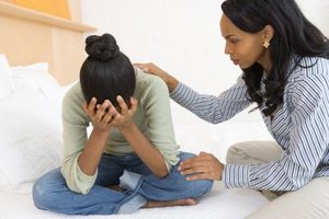 Jupiterimages/Creatas/Getty Images Being there for your teen daughter when she experiences a breakup will help her cope a little more easily.
