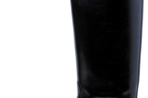 Qué combinar con un par de botas planas por encima de la rodilla.