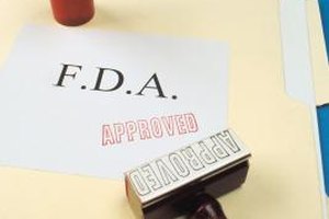 Comstock/Comstock/Getty Images A Master of Public Administration and a postgraduate science degree are advantageous for employment at the FDA.