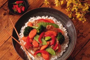 El arroz perfectamente cocinado se puede logra con la ayuda de una arrocera Rival rice.