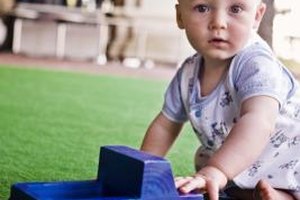 Jupiterimages/Goodshoot/Getty Images Even a simple act like pushing a toy truck across a carpet involves friction as well as kinetic energy.