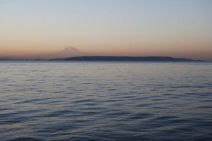 Ryan McVay/Digital Vision/Getty Images The docks of Puget Sound offer towns including Port Orchard water activites, festivals and boat viewing that kids will enjoy.
