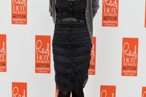 Gareth Cattermole/Getty Images Entertainment/Getty Images English actress Sadie Frost layers a cardigan over her strapless dress and adds tights to make it winter-ready.