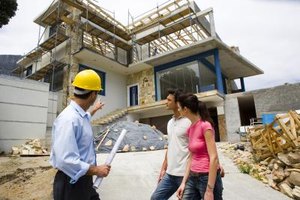 Jupiterimages/Pixland/Getty Images Self-employed business owners negotiate with clients on projects that subcontractors can help complete.