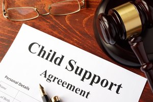 Child support agreement on an office table.