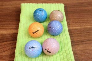 Espera a que las pelotas de golf se sequen.