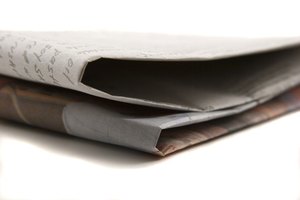 newspaper image by Photoeyes from Fotolia.com Analyzing
