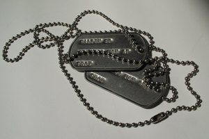 dog tags image by pearlguy from Fotolia.com Return dog tags to the Department of Defense to ensure the soldier's personal information doesn't fall into the wrong hands.