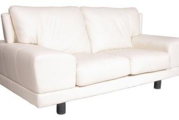 How can I clean cotton upholstered furniture?