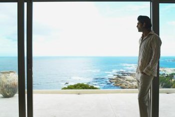 George Doyle/Stockbyte/Getty Images Let the interior of your home highlight the exterior views with these decor tricks.