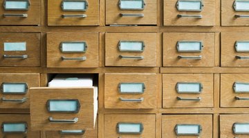 A card catalog contains author cards and book cards.