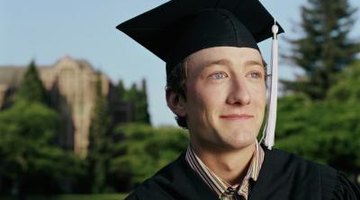 College graduate smiling in cap and gown