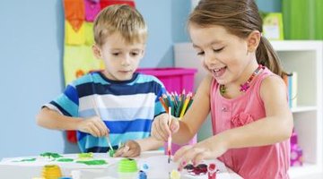 children painting in preschool