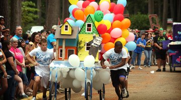  A team races in the SAU Family Day Annual Bed Race.