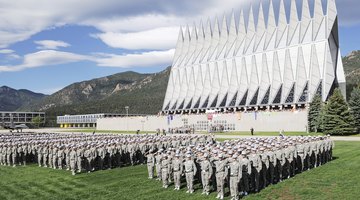 More than 1,300 basic cadets salute during the ceremonial Oath of Office formation on 26 June 2009. The Cadet Chapel is in the background.