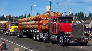 Peterbilt perfected the design and implemenation of the modern logging tractor-trailer rig.