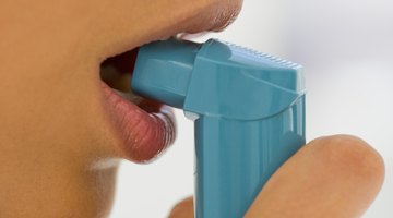 Respiratory therapists teach patients how to use asthma inhalers.