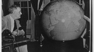 Franklin D. Roosevelt being presented a globe by the United States Army at the White House in Washington, D.C.