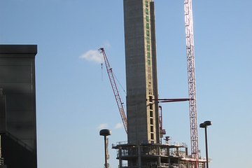 Cranes are used in the construction of tall buildings. Cranes are used in the construction of tall buildings.