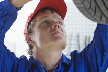 Mechanics perform basic duties such as balancing or rotating tires. Mechanics perform basic duties such as balancing or rotating tires.
