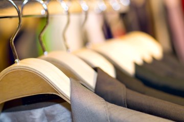 Clothing rack filled with men's suit jacket Clothing rack filled with men's suit jacket