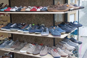 Shoes on a store's shelves. Shoes on a store's shelves.