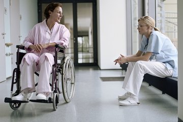 Disabled woman and care worker Disabled woman and care worker