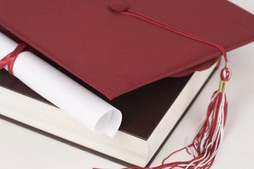 Master's Degree with book and cap. Master's Degree with book and cap.