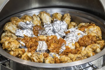 Chicken wings in a warming cabinet Chicken wings in a warming cabinet