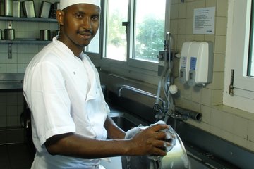 Kitchen porters may be responsible for washing pots and pans. Kitchen porters may be responsible for washing pots and pans.