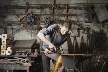 A machinist is working in the machine shop. A machinist is working in the machine shop.
