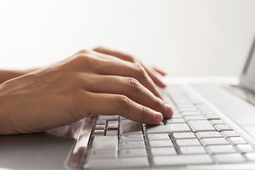 Woman typing Woman typing
