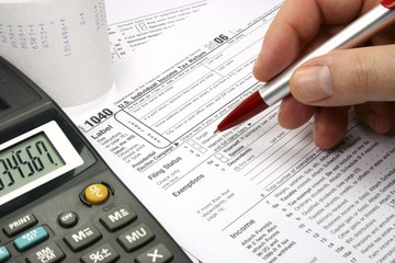 Tax forms being completed Tax forms being completed