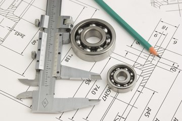 Calipers on a drafted document. Calipers on a drafted document.