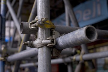Scaffolding poles joined together Scaffolding poles joined together