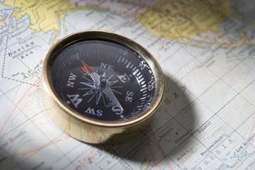 Compass on top of map Compass on top of map