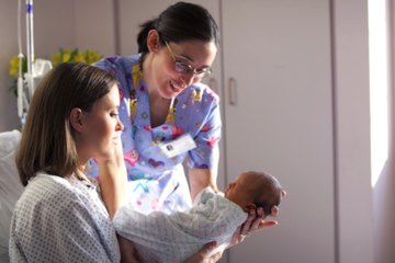 Neonatal nurse and mother Neonatal nurse and mother