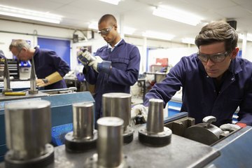 Industrial engineers in the lab working. Industrial engineers in the lab working.