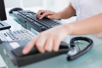 Woman answering phone Woman answering phone