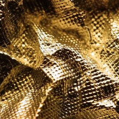 Photos.com/Photos.com/Getty Images Sparkling deco poly mesh is a popular decorating fabric for the holidays.