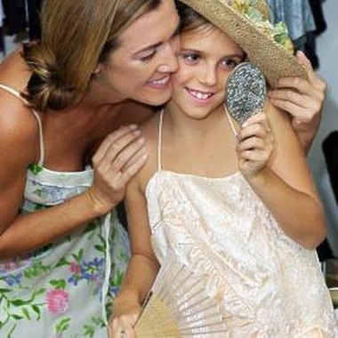 Thinkstock Images/Comstock/Getty Images Let your 9-year-old and her friends dress in tea party outfits.